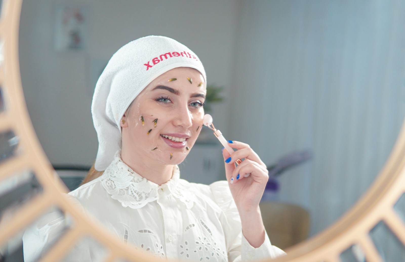 a woman in a white hat is brushing her teeth